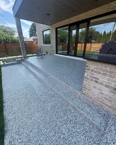 Covered patio and steps finished in blue-grey flake epoxy